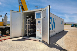 This shipping container holds a flow battery storage system developed by ESS Tech Inc. of Oregon. The company is aiming to meet the need for long-duration energy storage with batteries that can discharge electricity for up to 12 hours. Credit: ESS Tech