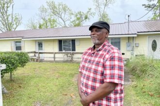 Dannie Bolden grew up in this house. He and other North Port St. Joe residents dream of revitalizing their neighborhood and uniting it with the other end of town. “Because of what we see happening on the other side of town, we know it’s possible,” he says. Credit: Amy Green