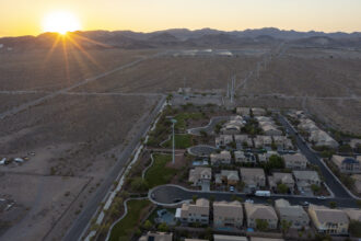 In an aerial view, urban sprawl spreads across the desert in Henderson, Nevada on July 1, 2021. Credit: David McNew/Getty Images
